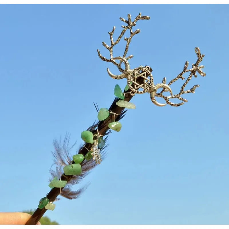 Decorative Amethyst Witch Crystal Wand with antlers, feathers, and heart-shaped leaves.